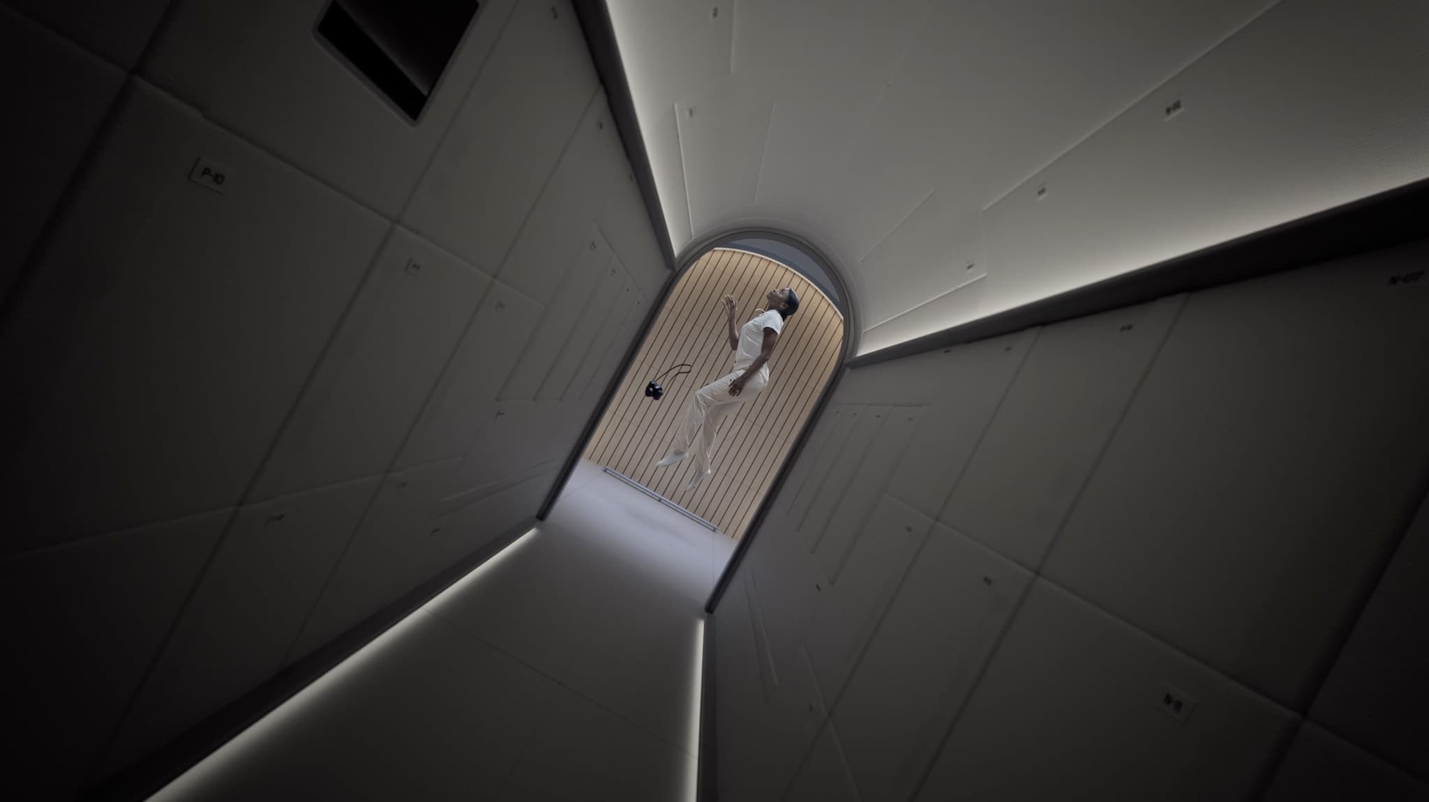 Crew member floating in zero gravity, video by Vast and Territory Studio